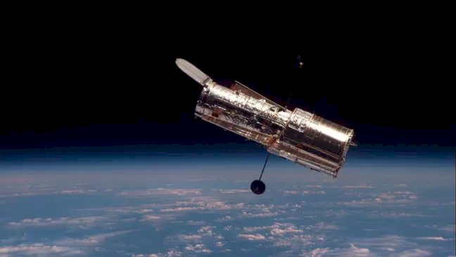 Hubble captura incrível imagem da fusão de duas galáxias